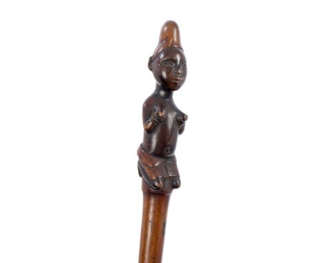 Finely carved antique African hardwood fertility stick with stylised kneeling female terminal and tapering staff, 82cm long, 