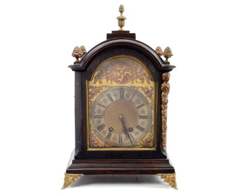 Late 19th century mantel clock with eight day movement striking on a gong, brass break arch dial with matted centre, gilt met