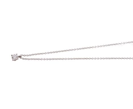 Tiffany & Co. solitaire diamond pendant with a brilliant cut diamond estimated to weigh approximately 0.17 carats, in four-cl