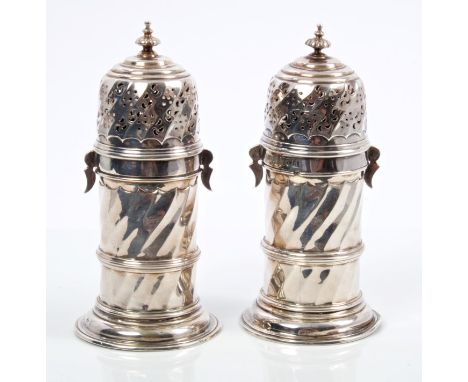Pair Victorian Britannia Standard silver sugar casters of lighthouse form, with wrythen decoration and detachable pierced cov