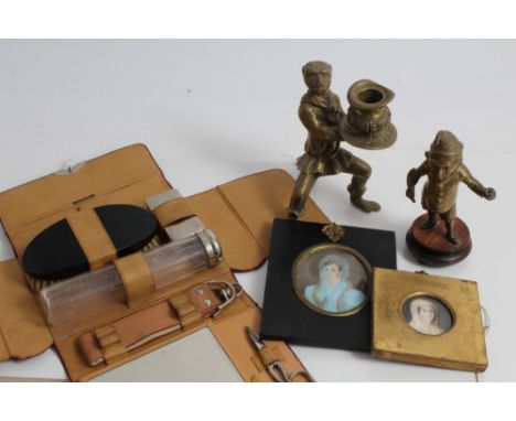 Sundry works of art - to include Victorian brass bar lighter in the form of Mr Punch, brass monkey candlestick, white metal-c