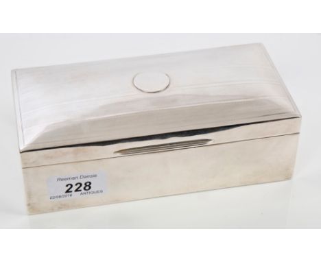 1920s silver cigarette box of rectangular form, hinged domed cover with engine-turned decoration and vacant cartouche (Cheste