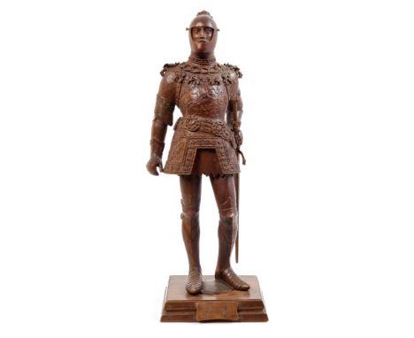 Late 19th century carved wooden figure of a knight, entitled - 'Arthur', wearing ceremonial armour and holding a hand and a h