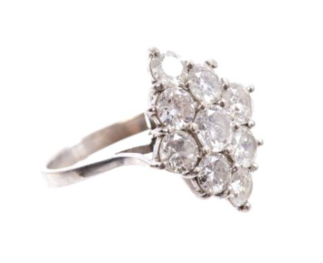 Diamond cluster ring with nine brilliant cut diamonds estimated to weigh approximately 2.1 carats in total, on white gold sha
