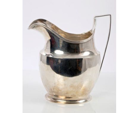Large George V silver jug of helmet form, with reeded border and angular handle (Birmingham 1915).  All at approximately 7ozs