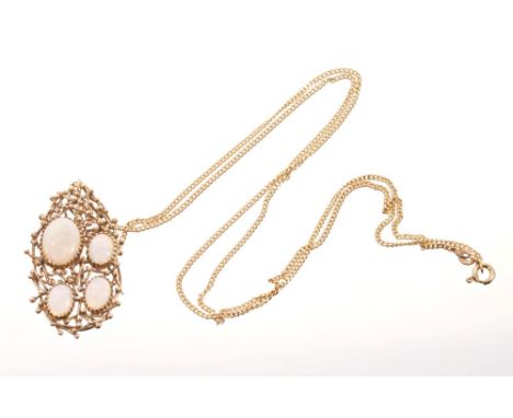 Opal pendant with four cabochon opals set within an abstract gold plaque, on gold chain