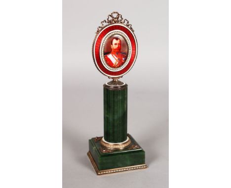 A SUPERB RUSSIAN SILVER GILT, JADE AND ENAMEL PORTRAIT MINIATURE STAND, with a portrait of NICHOLAS II, with seed pearl surro