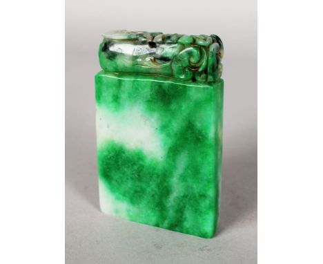 A SPECKLED GREEN JADE SEAL.  8.5cms.