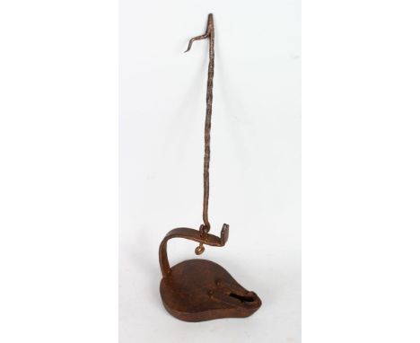 IRON BETTY LAMP. Height 16ins. The Betty Lamp first came into use in the 18th century.  They were commonly made of iron or br