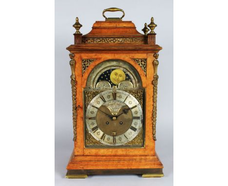 A GEORGE III MOONFACE BRACKET CLOCK by THOMAS CHEFFIELD, LONDON, in a walnut case (for restoration). 22ins high.