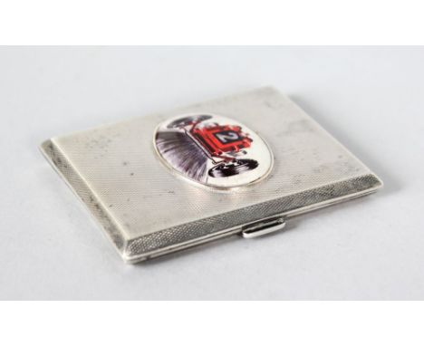AN ENGINE TURNED SILVER CIGARETTE CASE, Birmingham 1924, with an oval of a racing car, No. 2.