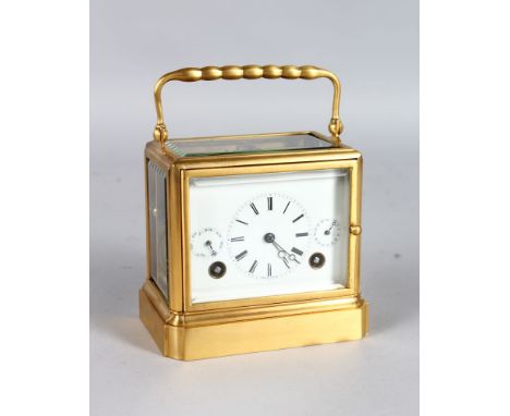 A SUPERB RARE MOSER OF PARIS BRASS CARRIAGE CLOCK, with eight-day movement, triple dial with month and days, striking on a si