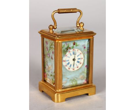 A CASED "SEVRES" CARRIAGE CLOCK with panels painted with birds and flowers.  6cms high.