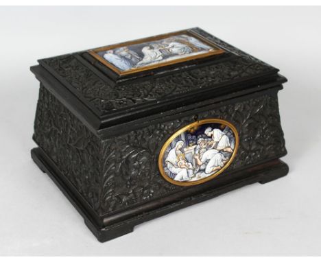 A SUPERB 18TH CENTURY CARVED WOODEN CASKET, the top and front inset with a LIMOGES ENAMEL PLAQUE of allegorical subjects, the