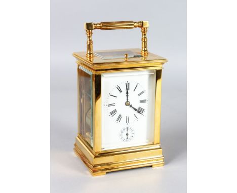 A SUPERB LARGE 19TH CENTURY FRENCH BRASS REPEATER CARRIAGE CLOCK, lever on the base, hours and quarters, quarters only, silen