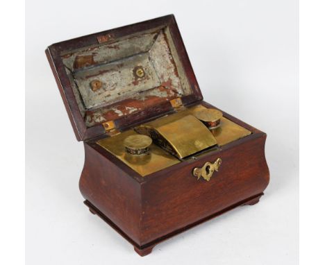 A GEORGE III SHAPED MAHOGANY TWO-DIVISION TEA CADDY with brass containers, supported on bracket feet.  7.5ins wide.