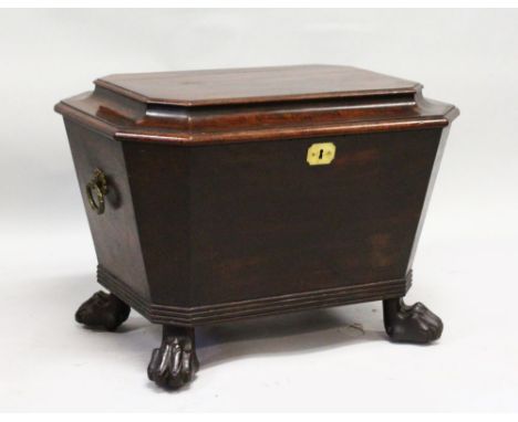 A GEORGE III MAHOGANY CELLARETTE, of sarcophagus form with brass ring handles, on carved paw feet. 2ft 2ins wide x 1ft 6ins h