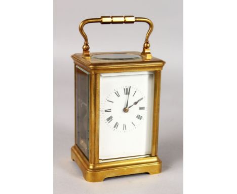 A 19TH CENTURY FRENCH BRASS TIMEPIECE CARRIAGE CLOCK. 4.5ins high.