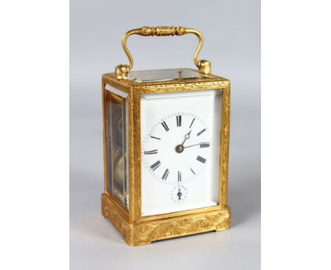 A SUPERB BREGUET A. PARIS ENGRAVED BRASS CARRIAGE CLOCK, repeat, alarm, striking on a single bell. 5.5ins high including carr