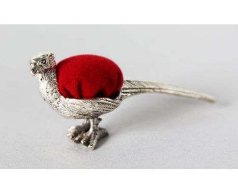 A MINIATURE SILVER PHEASANT PIN CUSHION.
