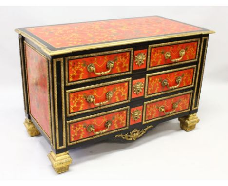 A SUPERB FRENCH MARQUETRY, ORMOLU AND EBONISED COMMODE, IN THE MANNER OF ANDRE CHARLES BOULLE, the top, sides and drawers wit