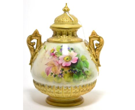 A Royal Worcester twin-handled Pot Pourri jar and cover, with inner cover, model number 1995, painted with flowers, signed Co