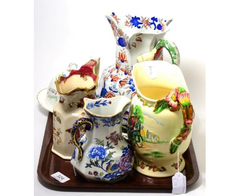 A Crown Devon Daisy Bell musical jug, three masons jugs, two Doulton plates and a Worcester preserve jar