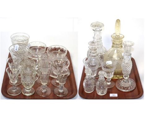 Two trays of cut glass including decanters, drinking glasses, candlestick, sundae dishes etc 