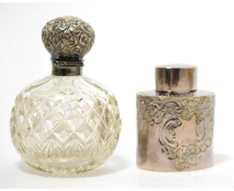 A Victorian silver tea caddy, Sheffield 1893 and a silver topped scent bottle, Birmingham 1899