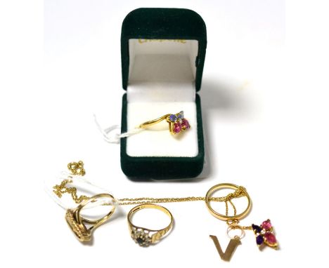 A 9ct gold band ring, opal ring, a cluster ring, a 9ct gold 'V' pendant, a gem set butterfly ring and necklace