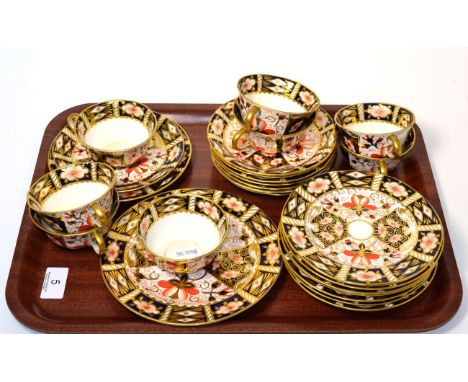 A Royal Crown Derby 2451 pattern Imari teaset, comprising eight cups, eight saucers, eight plates and a cake plate 