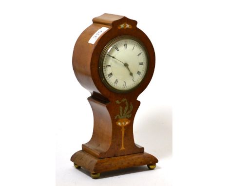 An Edwardian pewter, satin wood and mother of pearl inlaid mahogany balloon form mantel clock