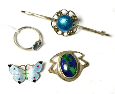 An Art Nouveau style silver and azurite set button, a silver and enamel ring by Charles Horner and two other brooches (4)