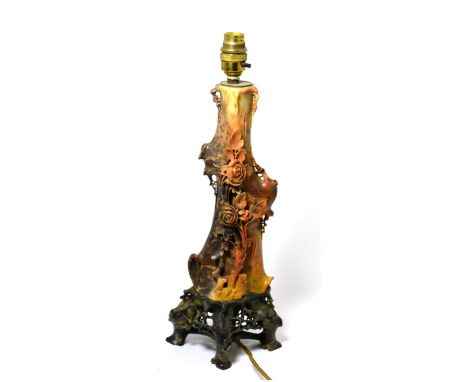A Chinese carved soapstone lamp base in the form of a blossoming branch