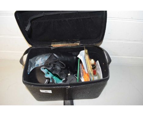 Box of various camera lenses and accessories