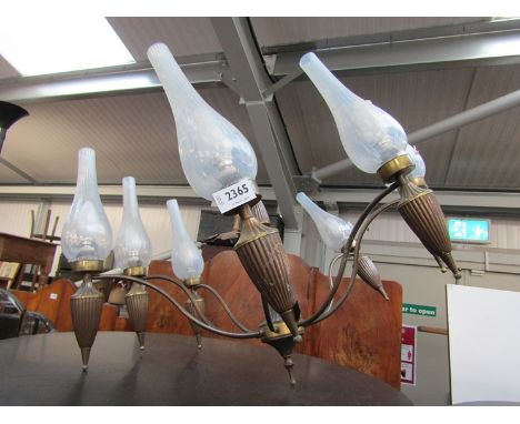 A 1970's style 8 branch ceiling light with glass shades
