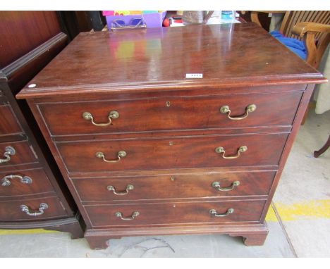 A George III mahogany cabinet, formerly a commode        