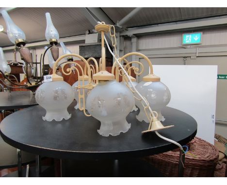 A cream Chinese style 5 branch electric light