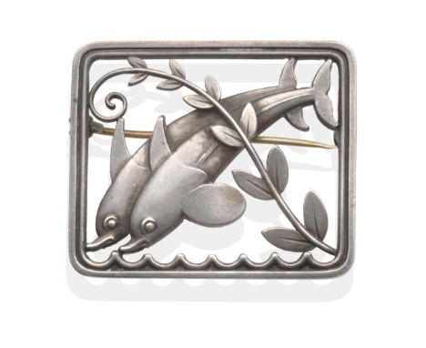 A Silver Georg Jensen Dolphin Brooch, Designed by Arno Malinowski, model number 251, modelled as two leaping dolphins in a re