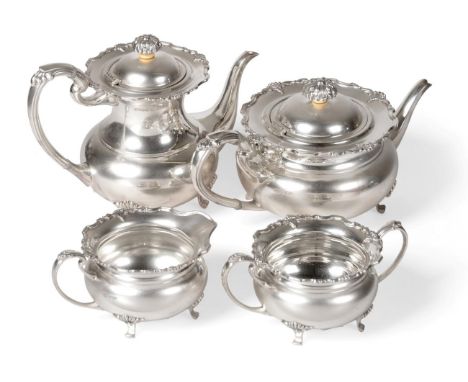 An Elizabeth II Silver Four Piece Tea and Coffee Service, Sheffield 1972, of baluster form with reeded handles and shell cast