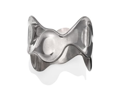 A Silver Georg Jensen Cuff Bangle, Designed by Ibe Dahlquist, model number 211, of abstract wavy design, measures 5cm wide se