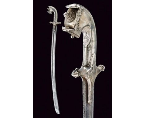 dating: 19th Century provenance: Arabian Peninsula, Single-edged, curved blade with dorsal groove and central fuller. Hilt of