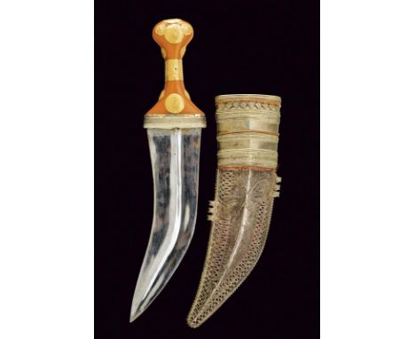 dating: Mid 20th Century provenance: Arabian Peninsula, Wide, curved, double-edged blade, with central rib. Grip of typical s