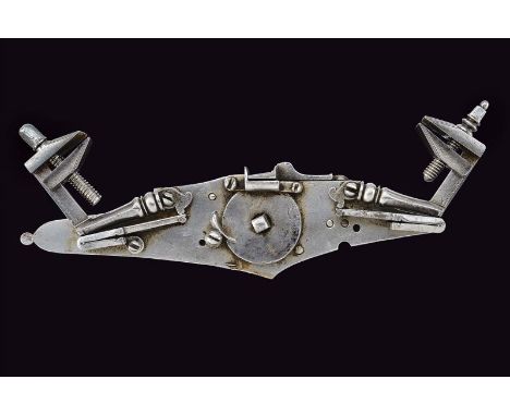 dating: early 17th Century provenance: Brescia, Lock plate of elongated shape, with tang provided with a button and typical d