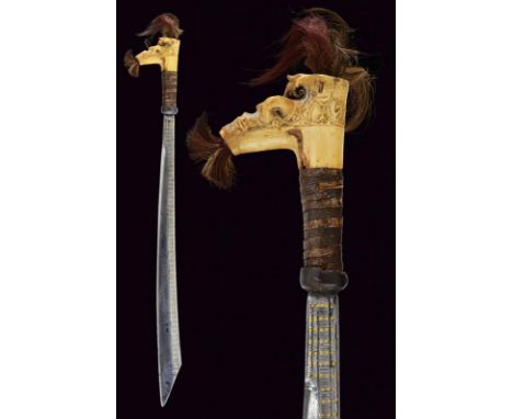dating: circa 1900 provenance: Kalimantan, Straight, single-edged blade, flat on one side, with straight back and angled at t