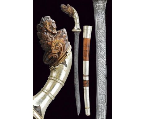 dating: 19th Century provenance: Palembang, Interesting, curved, flat, single-edged pamor blade, completely inlaid with silve