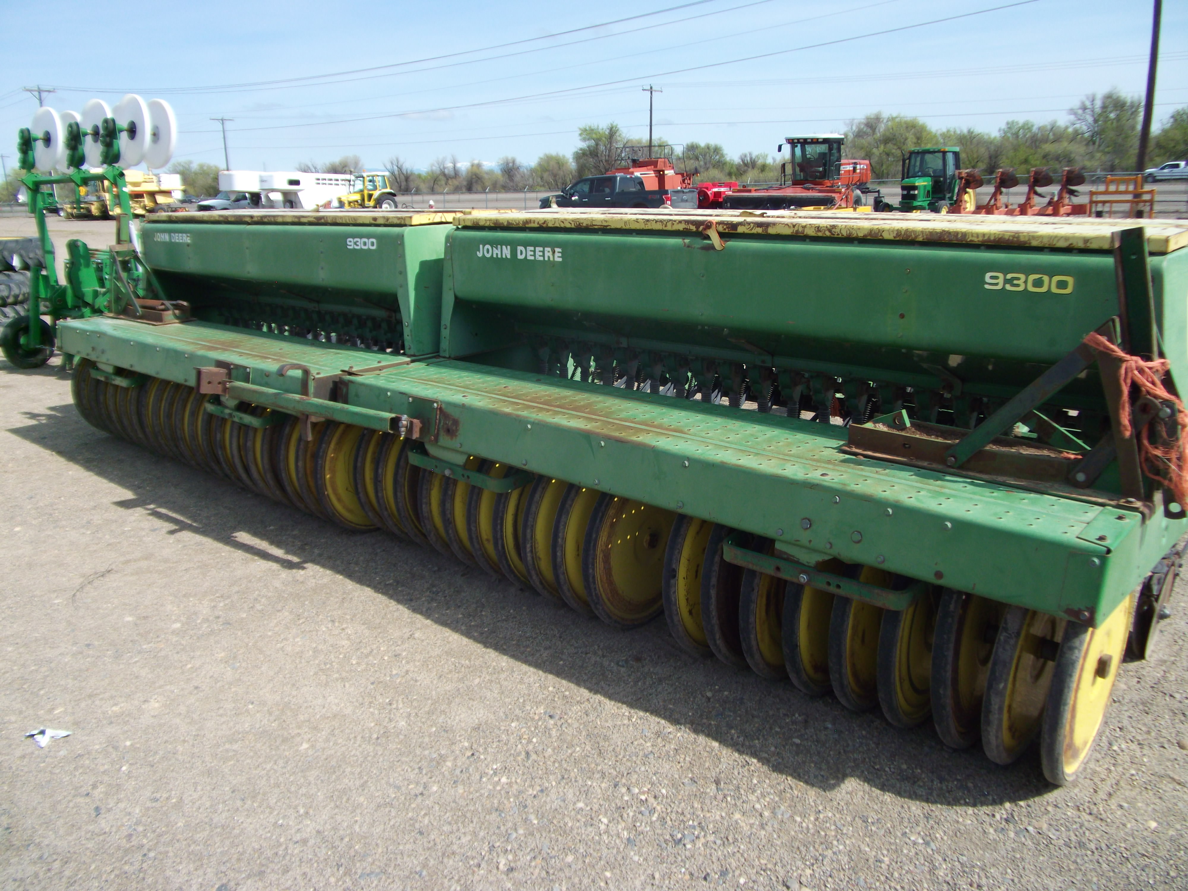 JD 9300 10' double disc press wheel grain drills w/tandem hitch