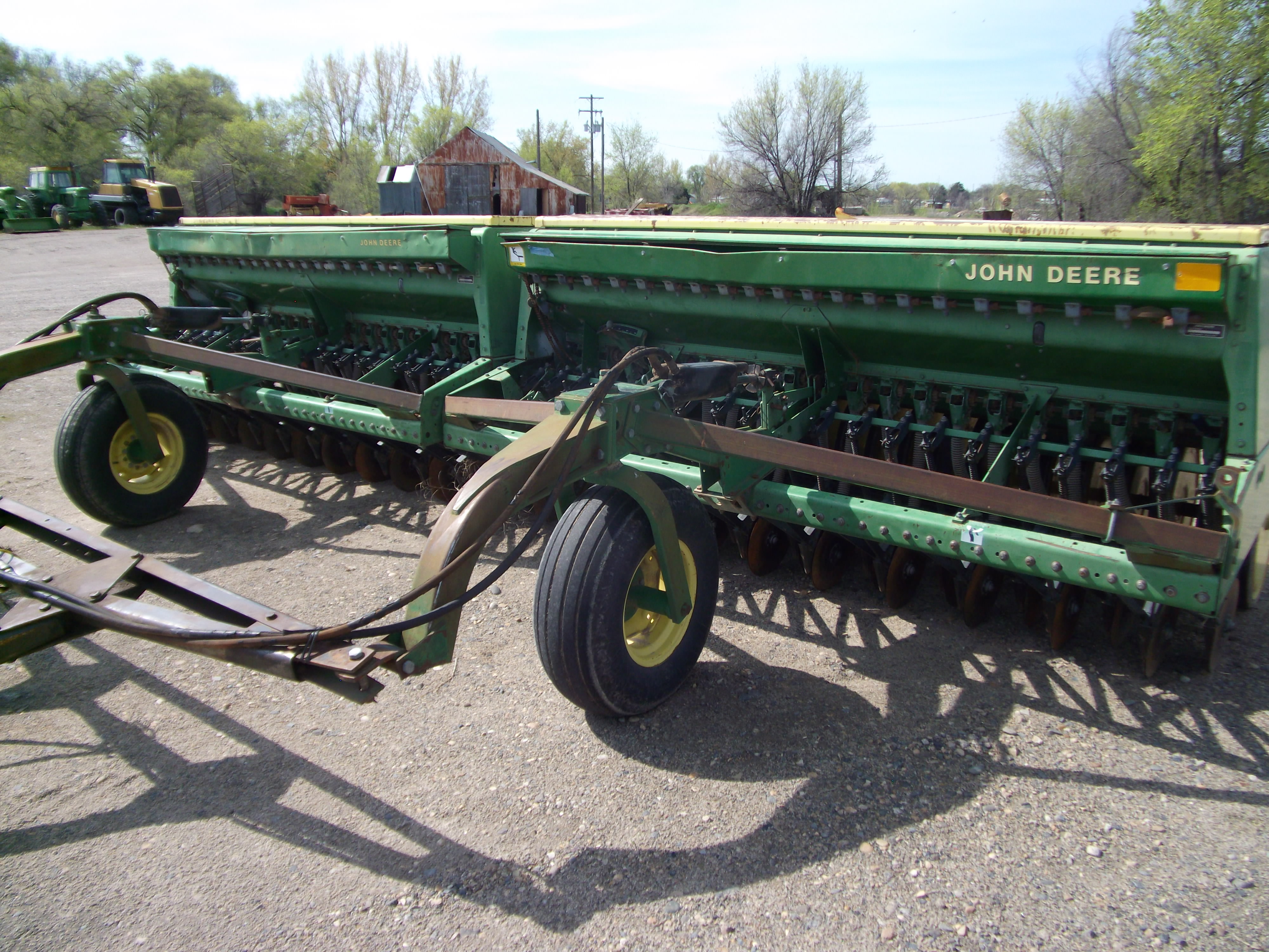 JD 9300 10' double disc press wheel grain drills w/tandem hitch