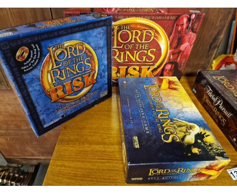 Lord of the Rings Risk Board Game + Parkers Risk Gondor and Mordor Expansion Set, as well as a Cryptozoic Lord of the Rings D