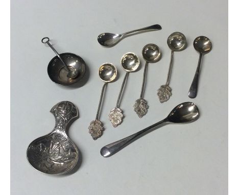 A bag containing silver caddy spoons, salt spoons etc. Approx. 56 grams. Est. £20 - £30.